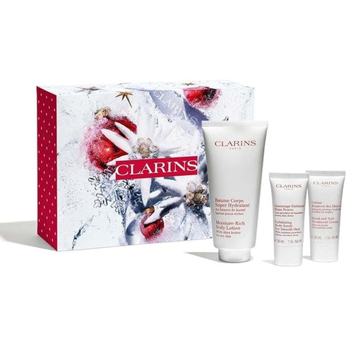 Clarins Body Care Gift Set 200ml Moisture Rich Body Lotion + 30ml Hand And Nail Treatment Cream + 30ml Exfoliating Body Scrub + Wash Bag